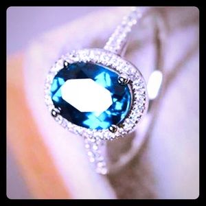 Large blue topaz stone with cubic pave in silver 6